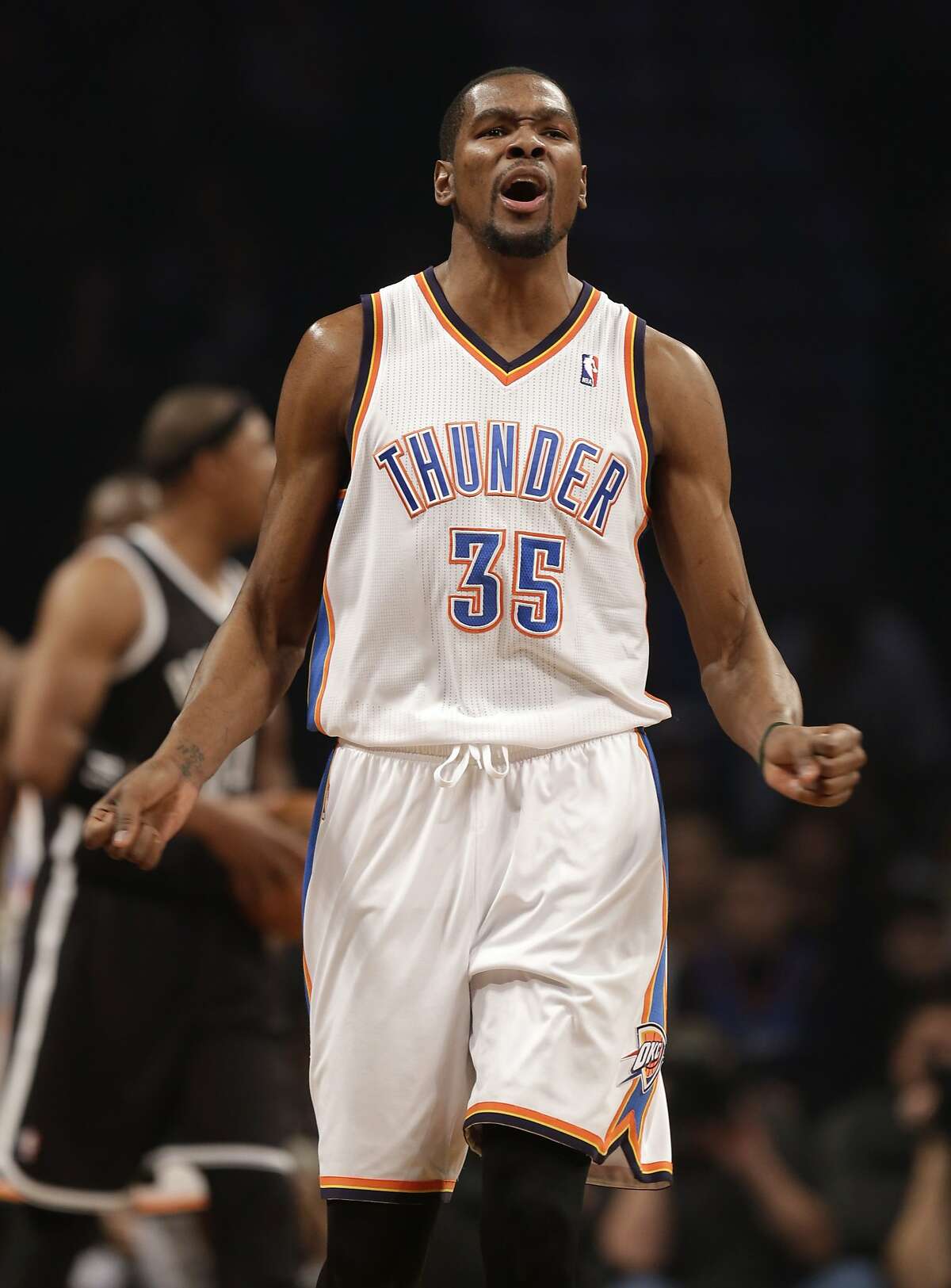Oklahoma City Thunder's Kevin Durant reacts during the first half of the NBA basketball game at the Barclays Center, Friday, Jan. 31, 2014, in New York. (AP Photo/Seth Wenig)