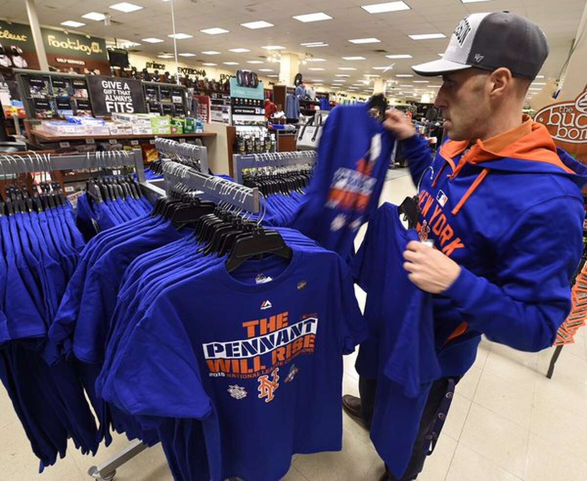 Joe Agostinelli stops at Dick's Sporting Goods to pick up his Mets pennant-winning shirts early Thursday, Oct. 22, 2015. (Skip Dickstein/Times Union)