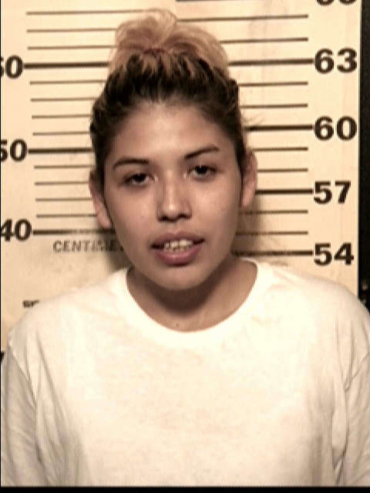 Mercedes Salazar, seen in this booking photo from 2005, is currently wanted on an aggravated kidnapping charge. She has been booked into the Bexar County Jail 11 times on 43 different charges since she was 17, according to the Sheriff's Office.