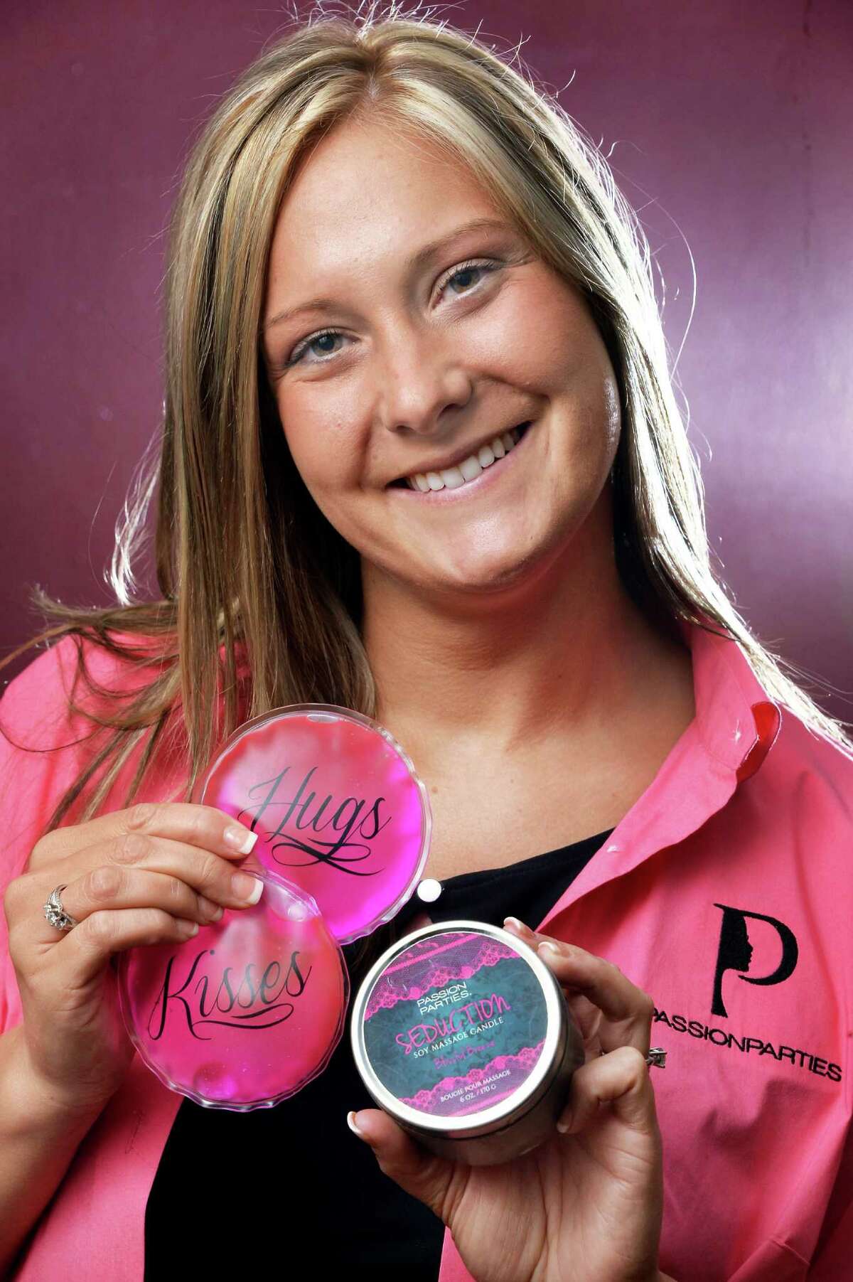 Sophia Holcomb with Passion Parties, an "adult sensual products" company. (John Carl D'Annibale / Times Union)