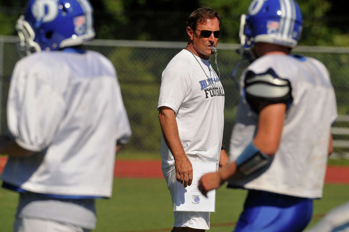 Head coach Rob Trifone watches as his team does drills during Darien High School football practice at Darien High School in Darien, Conn., on Tuesday, Sept. 15, 2015. Darien's first game is this Friday at 6:30 p.m. at Stamford High School.