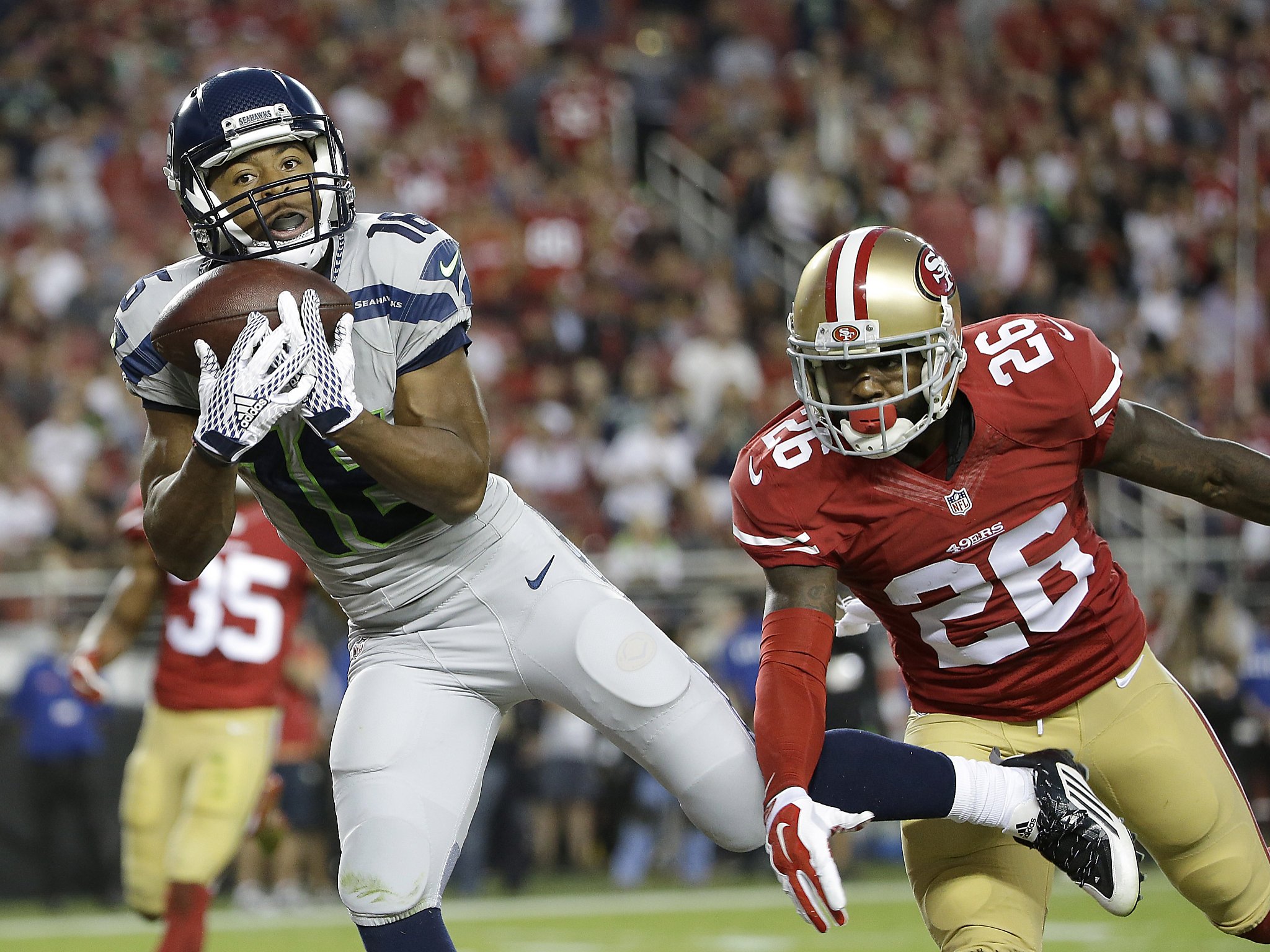 49ers defensive back L.J. McCray tries to prevent a punt from