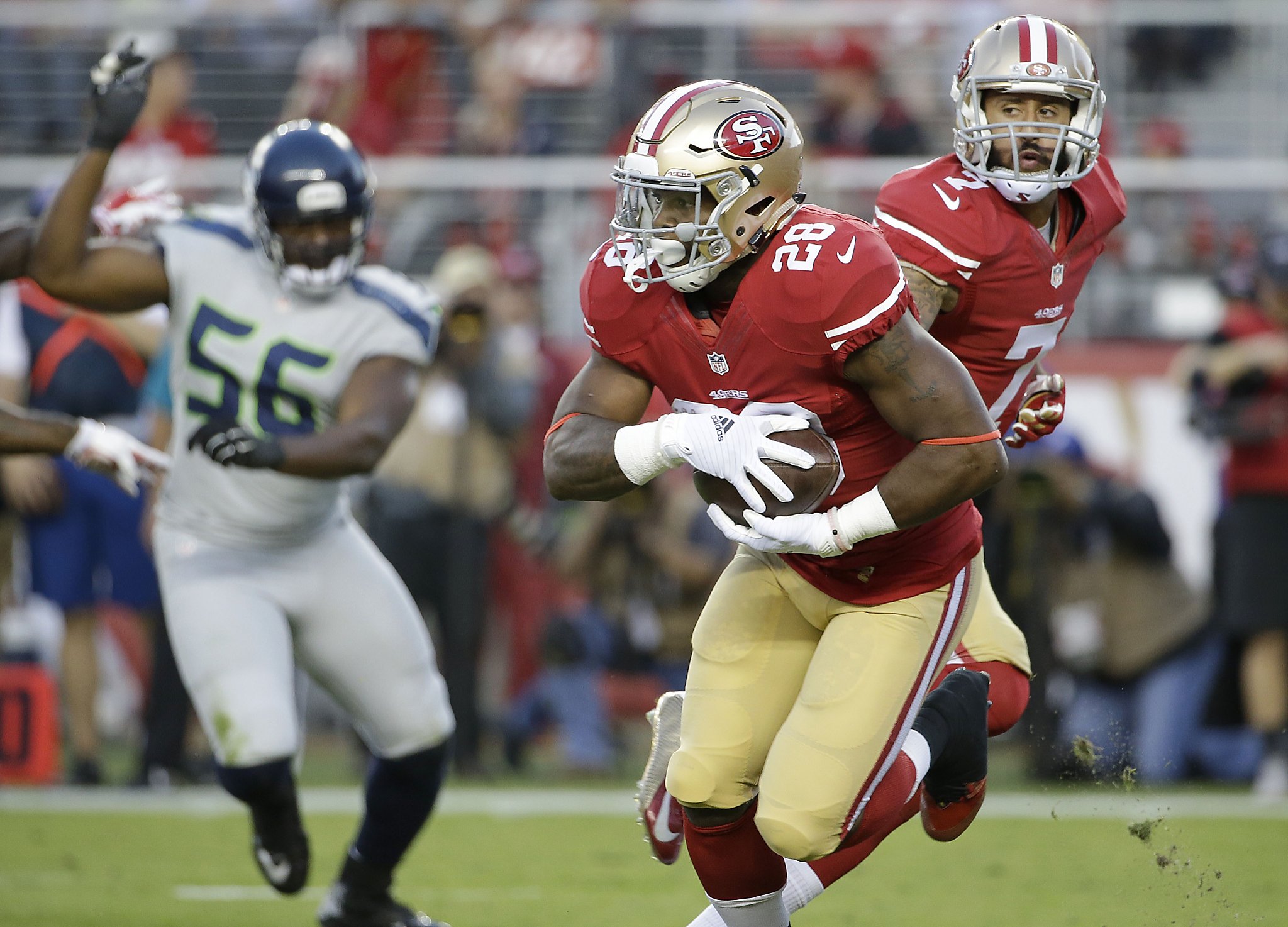 49ers defensive back L.J. McCray tries to prevent a punt from