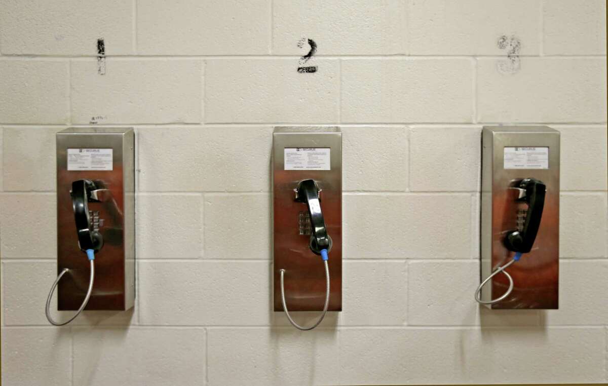 Pay phones in the jail cells at the Harris County Sheriff's Office and Detention Center Thursday, Oct. 22, 2015, in Houston, Texas.