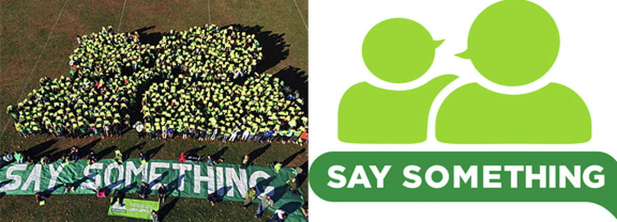 Broadview Middle School in the formation of Sandy Hook Promise’s ‘Say Something’ logo Friday.