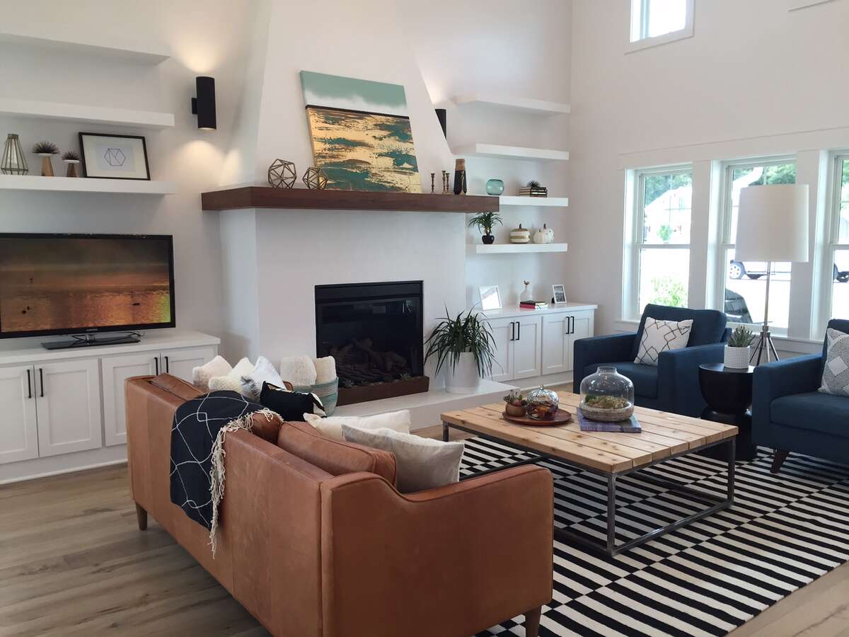 A modern farmhouse near the heart of Fredericksburg includes a walnut mantel on the plaster fireplace and 20-foot vaulted ceiling in the living room. The house by Hominick Custom Builders is one of nine featured on the 2015 Hill Country Builders Parade Home Tour. Directions to the houses and more information about the tour, including changes because of weather, can be found at HillCountryBuilders.org.