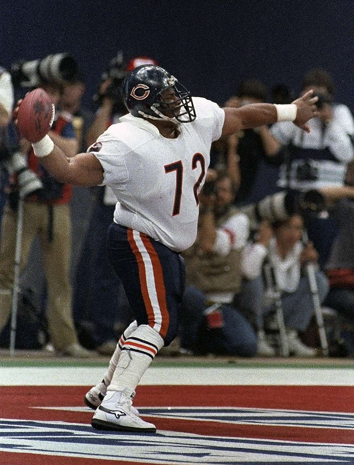 William Refrigerator Perry of the Chicago Bears carries the ball