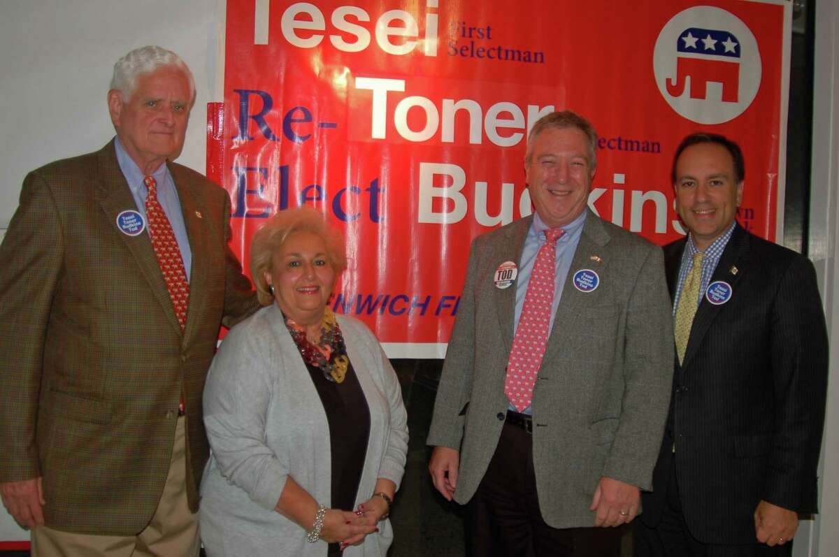 Selectman John Toner, left, Town Clerk Carmella Budkins, Tax Collector Tod Laudonia and First Selectman Peter Tesei attend the opening of Republican headquarters on East Putnam Avenue.