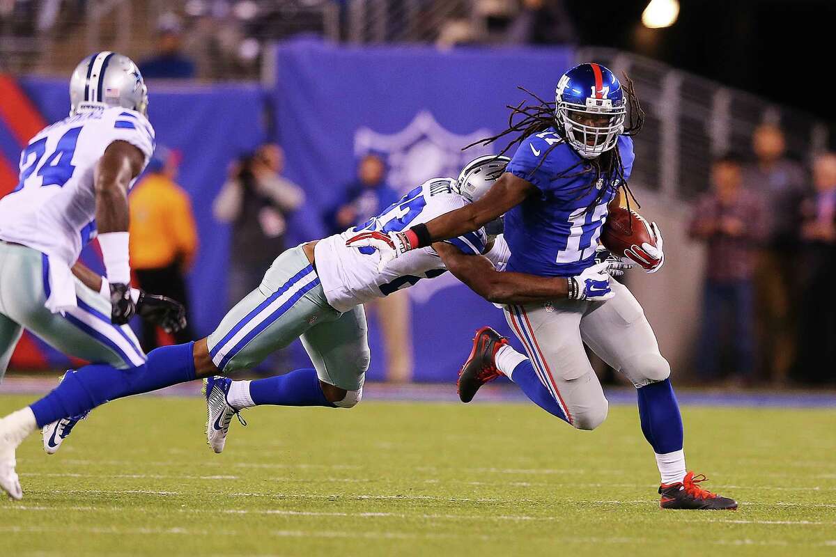 EAST RUTHERFORD, NJ - OCTOBER 25: Dwayne Harris #17 of the New York Giants avoids the tackle attempt of Corey White #23 of the Dallas Cowboys during the fourth quarter at MetLife Stadium on October 25, 2015 in East Rutherford, New Jersey. The New York Giants defeated the Dallas Cowboys 27-20. (Photo by Elsa/Getty Images)