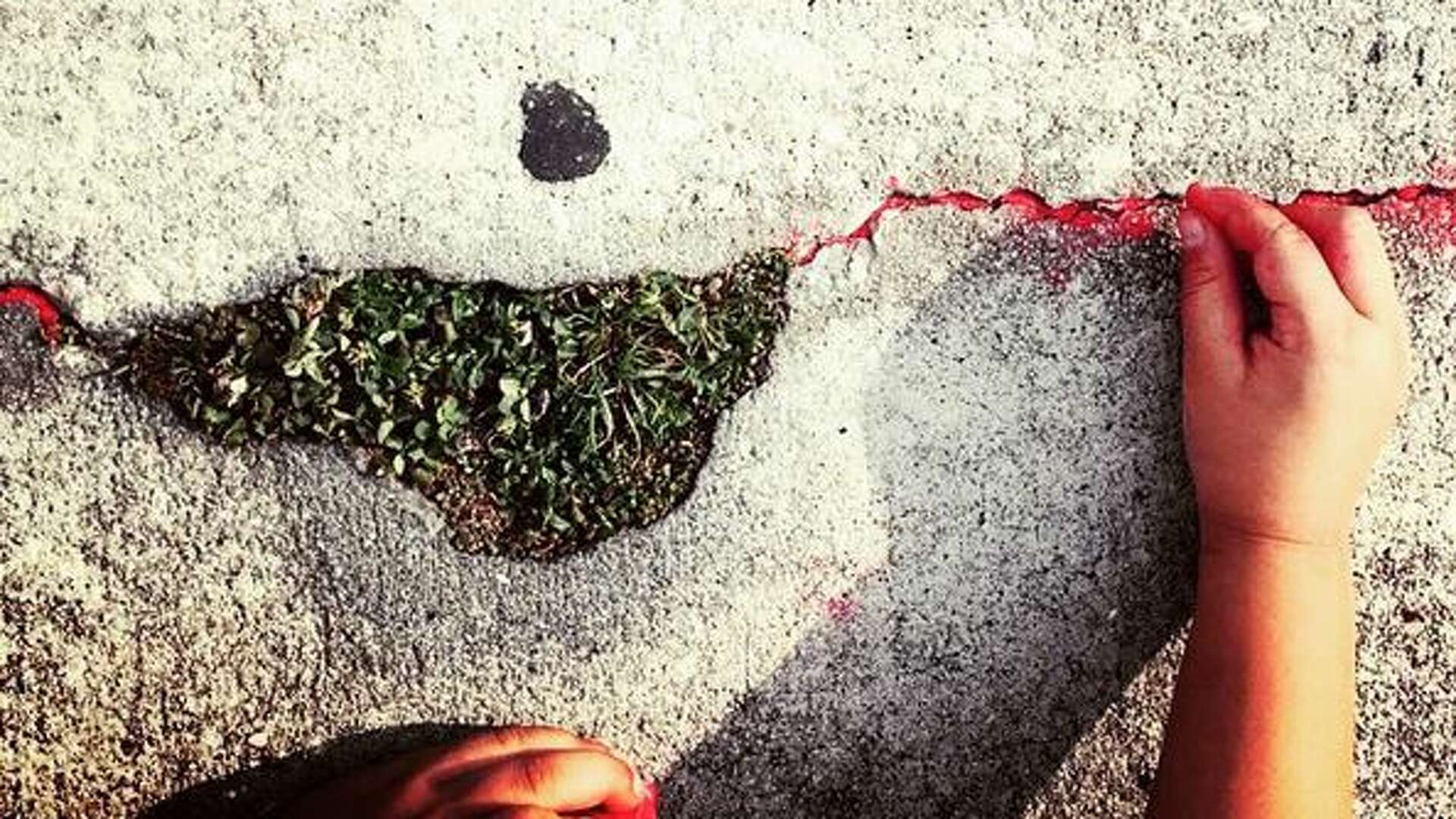 In the cracks: Art, red sand, and human trafficking