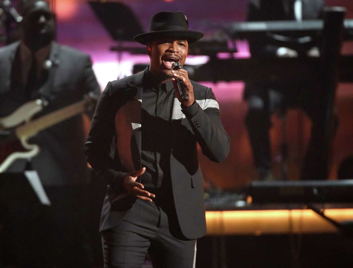 FILE - In this June 28, 2015 file photo, Ne-Yo performs during a tribute to Smokey Robinson at the BET Awards in Los Angeles. Whether belting out lyrics to Al Greenâs "Letâs Stay Together," leading a mournful congregation through "Amazing Grace," or tweeting his Spotify music playlist that includes Stevie Wonder and Nina Simone, President Barack Obama is showing that heâs a pretty soulful guy. (Photo by Chris Pizzello/Invision/AP, File)