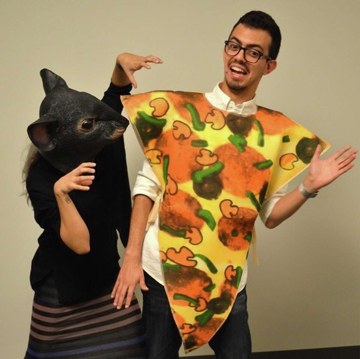 Costumes include pop-culture references, such as this Pizza Rat.