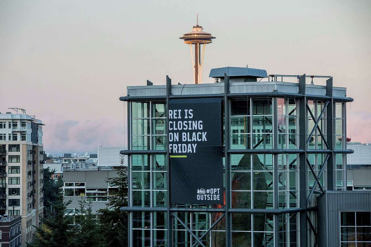 Specialty Outdoor Retailer REI announces it will close 143 stores on Black Friday this year. Pictured, the chain’s Seattle flagship store.