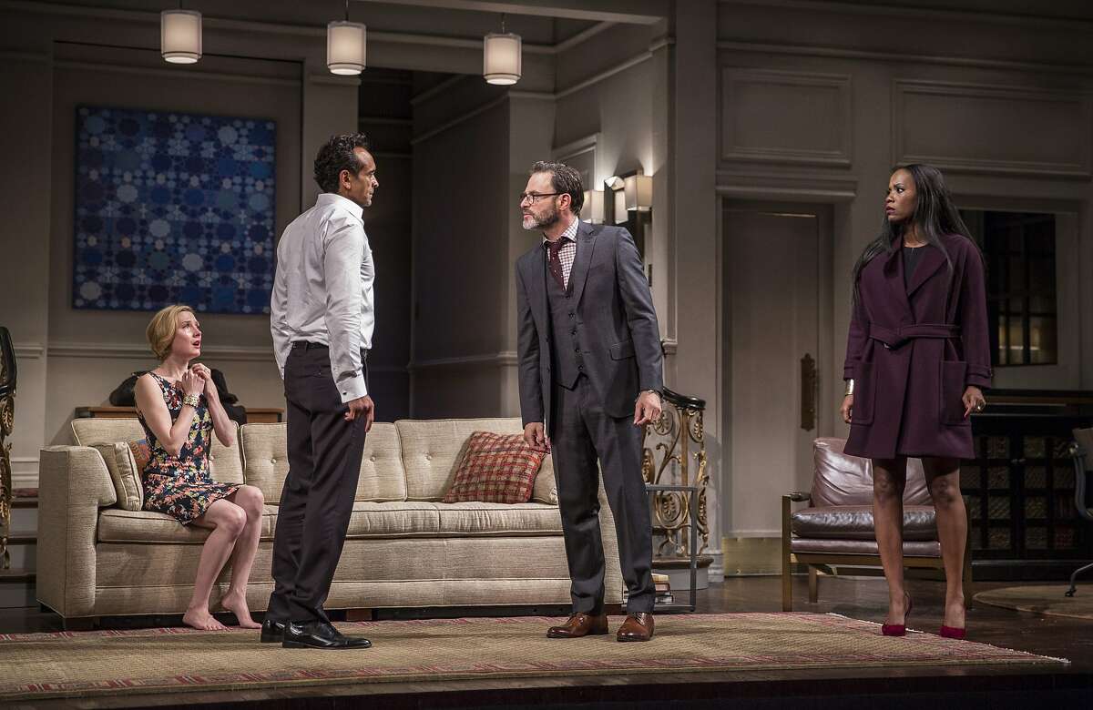 Amir (Bernard White, second from left) and Isaac (J. Anthony Crane) face off as their wives Emily (Nisi Sturgis, left) and Amir's colleague Jory (Zakiya Young, right) watch in "Disgraced" at Berkeley Rep