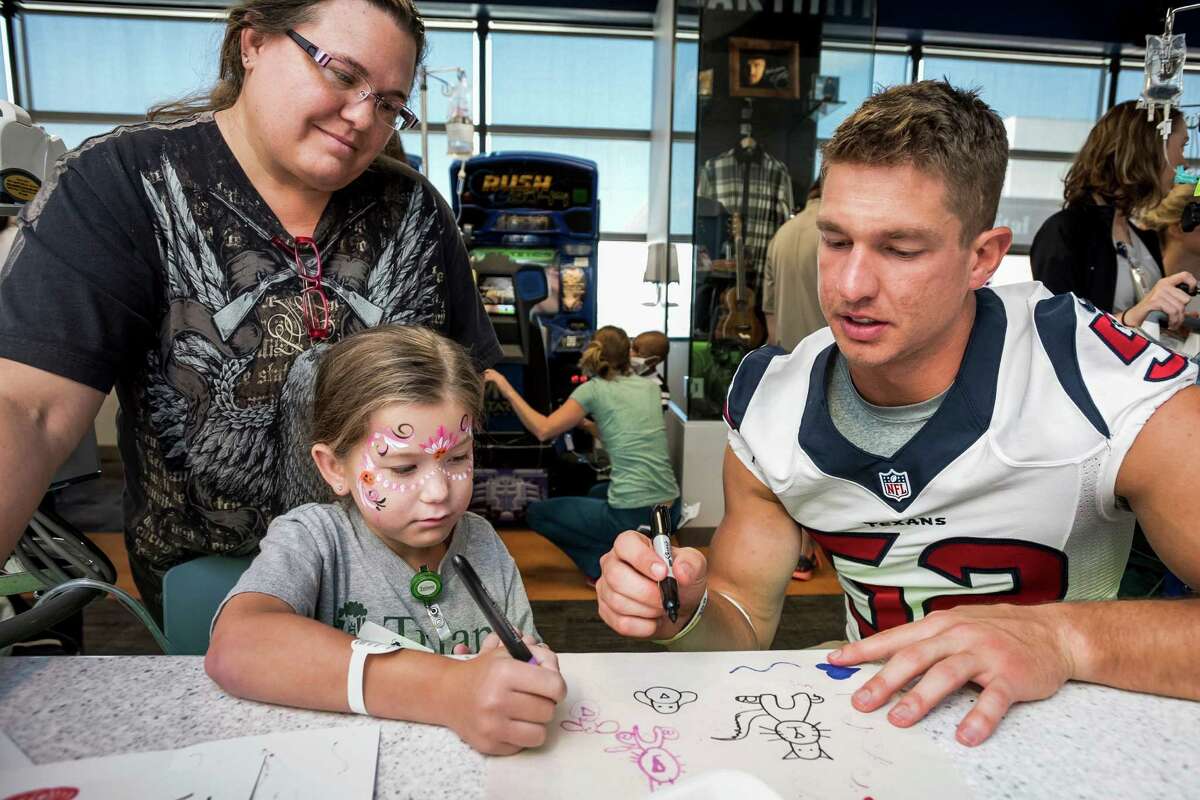 Houston Texans surprise kids at Texas Children's Hospital with surprise  Halloween visit