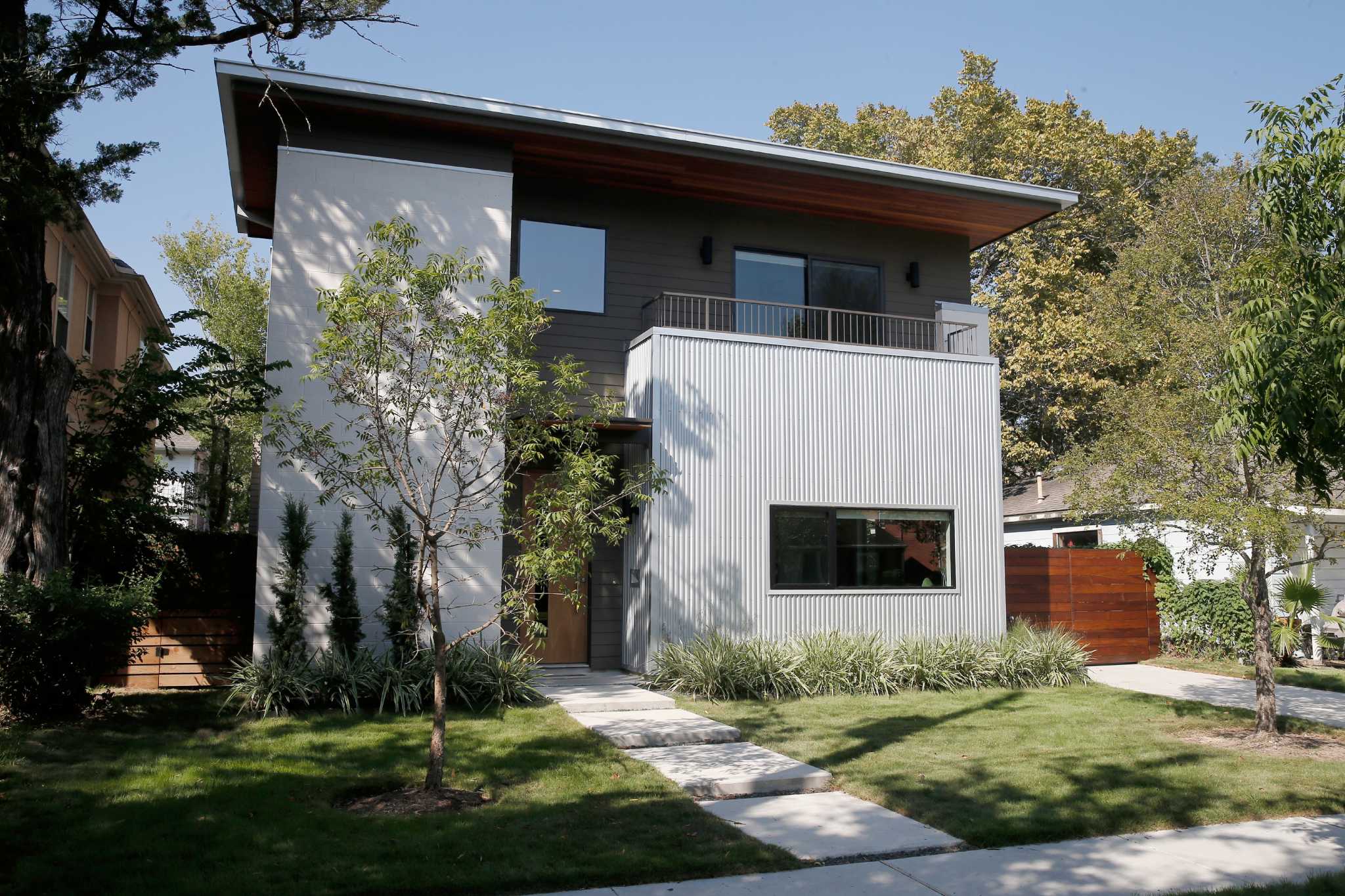 Young family builds a cozy modern space in West U