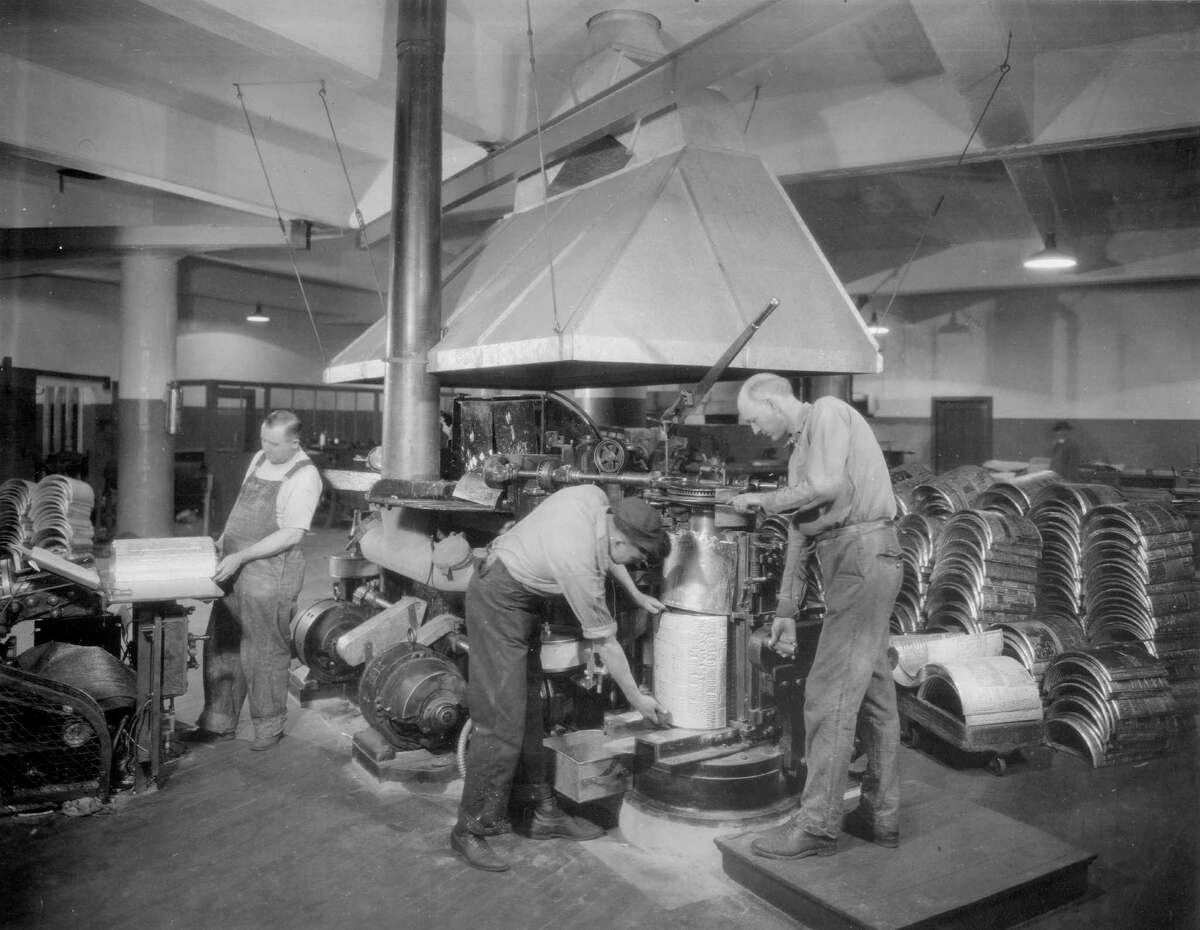 Stereotypers are at work at The Chronicle in preparation of the daily printing process in 1926.