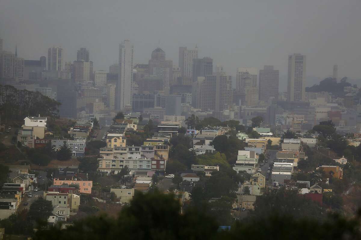 A view of downtown and Coit tower from the hills of John McLaren Park during patchy weather in San Francisco, Calif., on Wednesday, October 28, 2015.