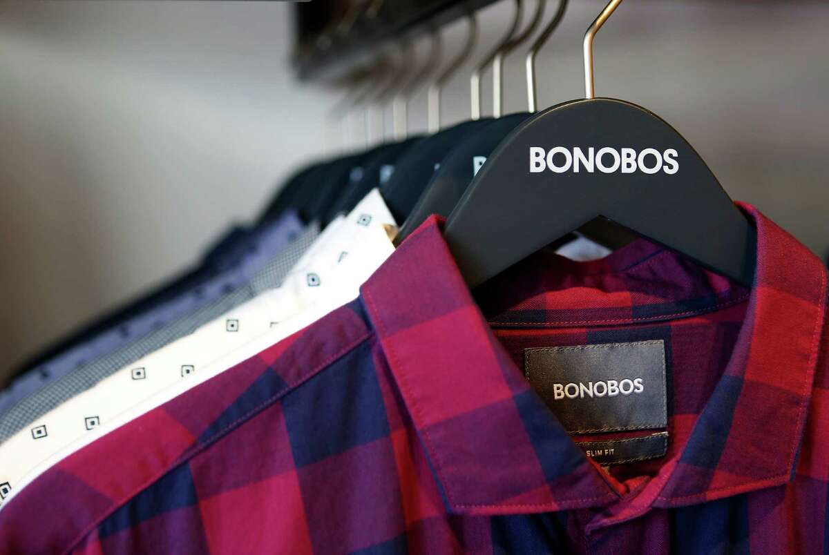 Shirts hang to be tried on at the new Bonobos Guideshop in River Oaks, Wednesday, Oct. 28, 2015, in Houston. The Guideshop allows men to come into the store, try clothes on, and then order the clothes online to be delivered to their door.