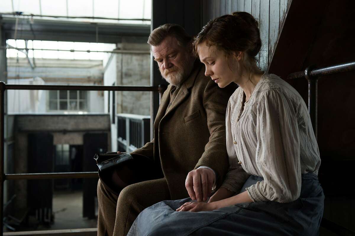 In this image released by Focus Features, Brendan Gleeson portrays Inspector Arthur Steed and Carey Mulligan portrays Maud Watts, right, in a scene from "Suffragette." (Steffan Hill/Focus Features via AP)