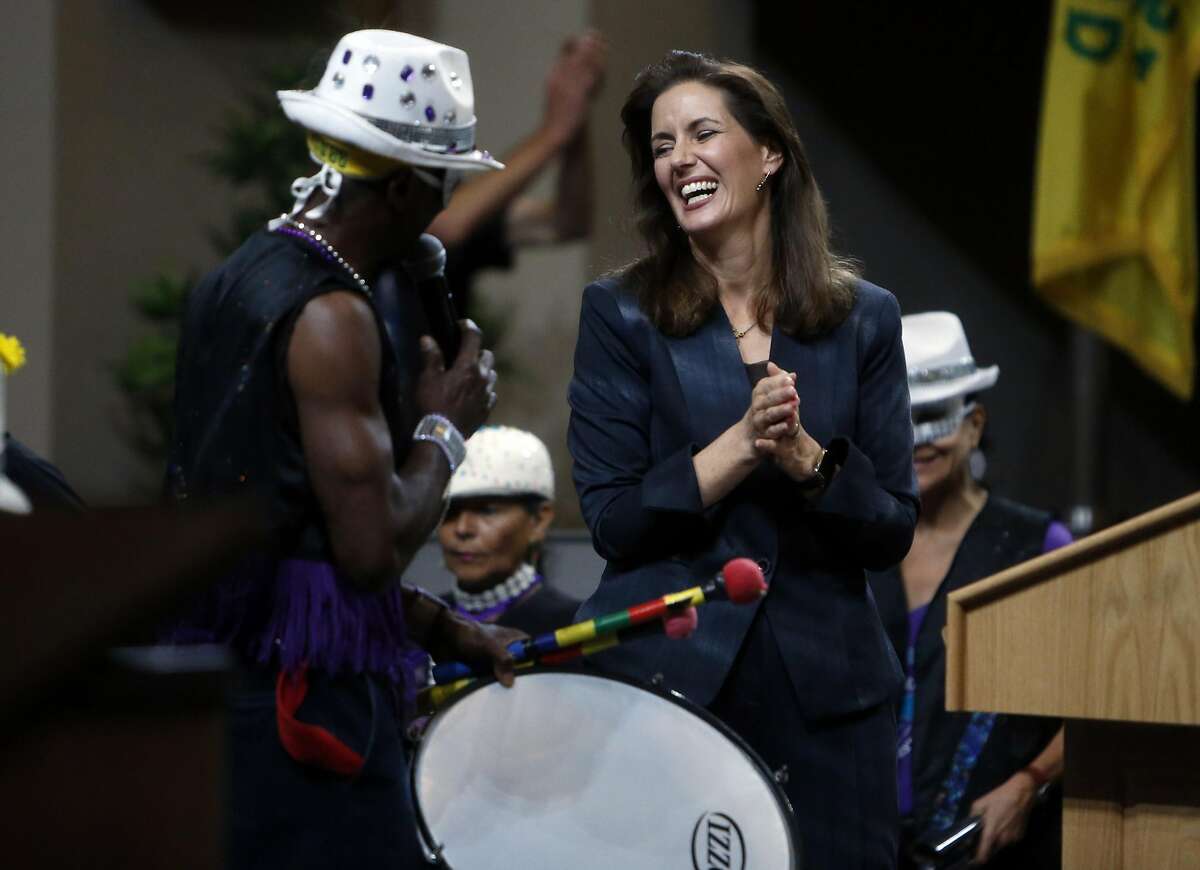 Oakland Mayor Libby Schaaf reacts to a band playing after her "State of the City" address at City Hall in Oakland, Calif., on Wednesday, October 28, 2015.