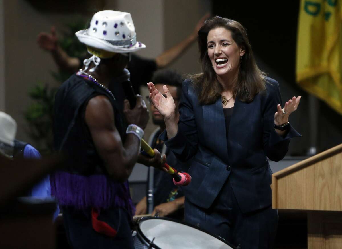 Oakland Mayor Libby Schaaf reacts to a band playing after her "State of the City" address at City Hall in Oakland, Calif., on Wednesday, October 28, 2015.