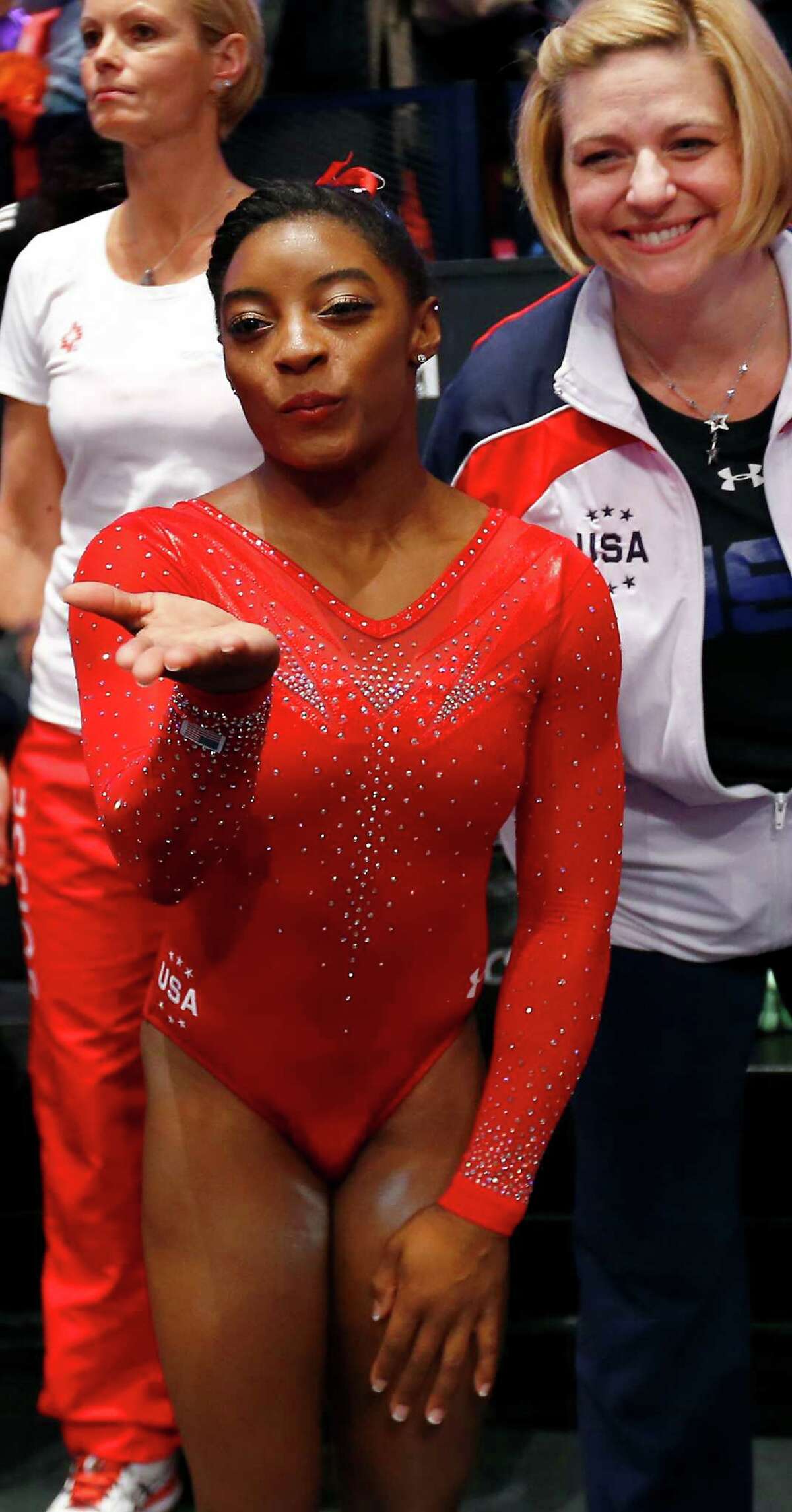 Spring's Simone Biles wins third straight world allaround gymnastics title