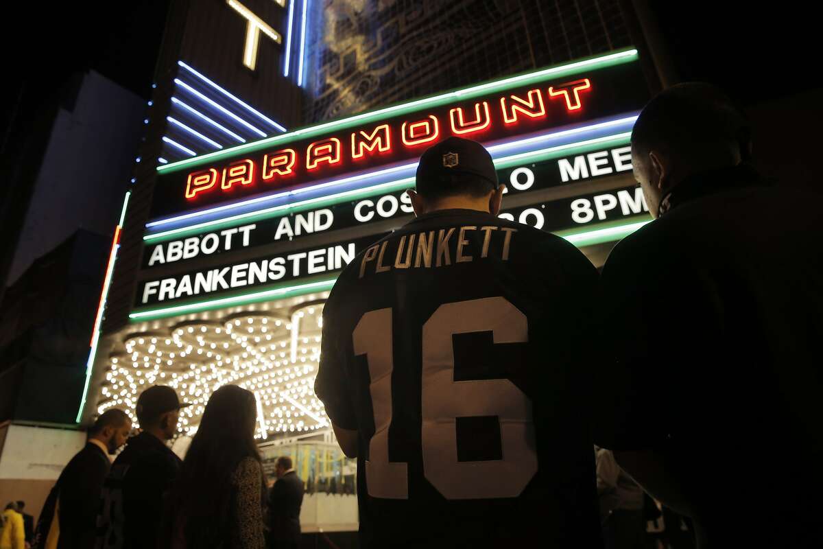 Luis Valencia of Oakland waits outside waiting to enter the Paramount Theater before members of NFL Commissioner Richard Goodellâ€™s staff held a public hearing on the idea of the Raiders football team moving to southern California at the Paramount Theater in Oakland, Calif., on Thursday, October 29, 2015.