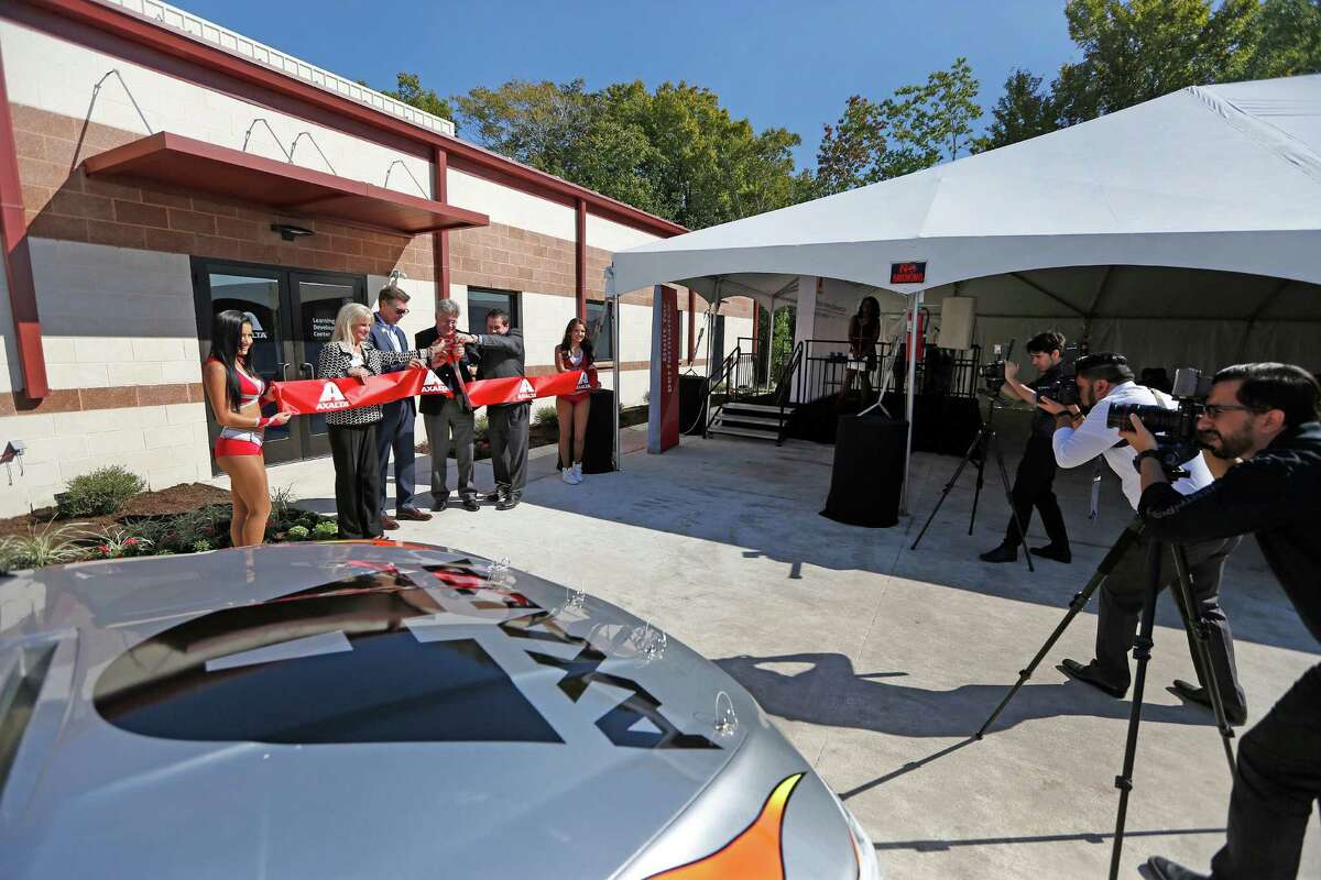 The official ribbon-cutting was held for Axalta Coating Systems' Refinish and Powder Coatings Training Center, 6800 Genard Rd., grand opening, for collision repair Thursday, Oct. 29, 2015, in Houston. ( Steve Gonzales / Houston Chronicle )