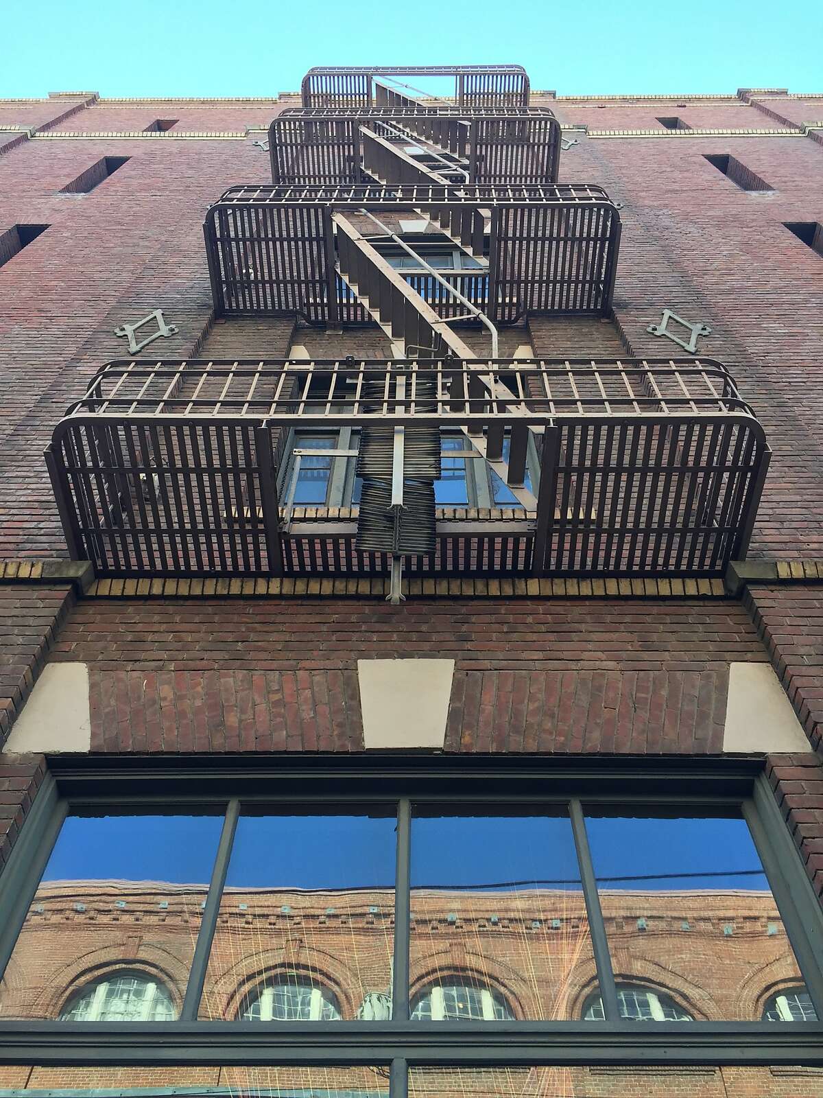 The view from 15th Street of 200 Rhode Island, a five story brick warehouse from 1912 that now holds a variety of firms.