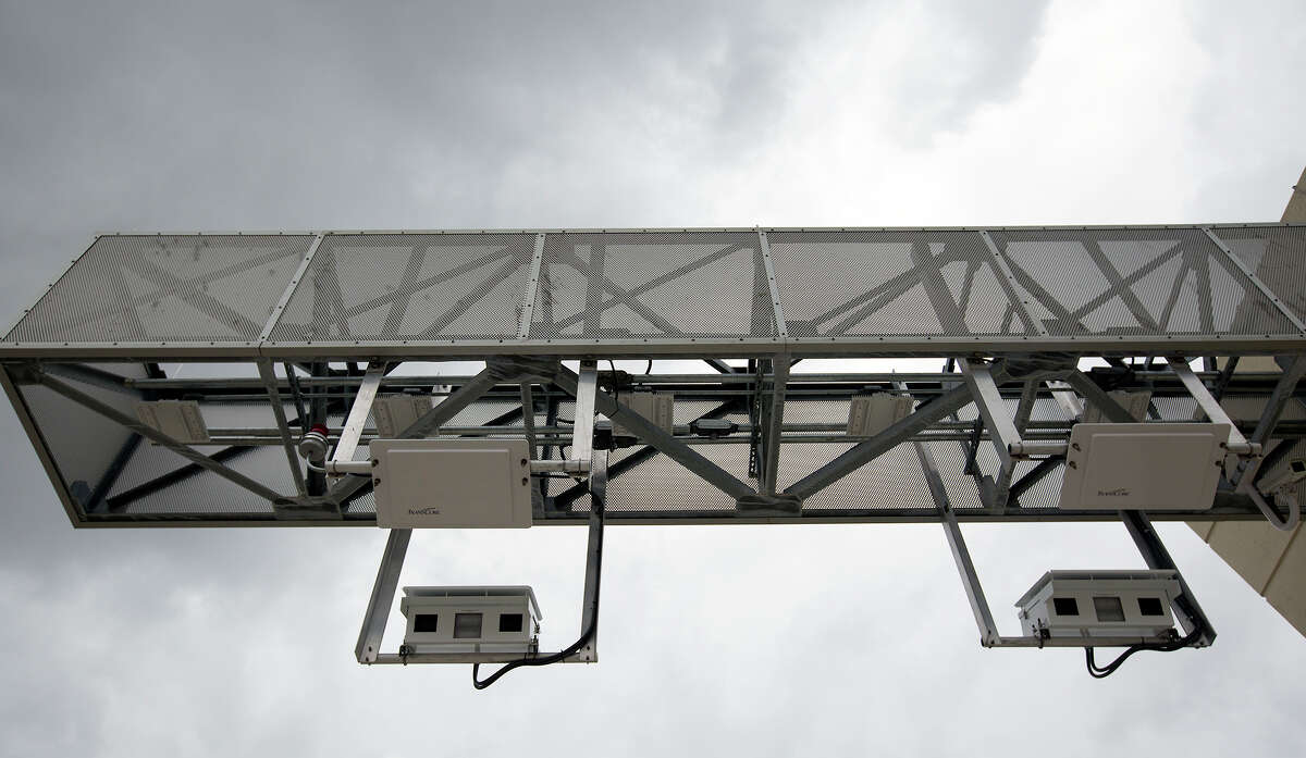Toll tag cameras are seen along the Sam Houston Tollway entrance ramp from Texas 249 on Oct. 30.