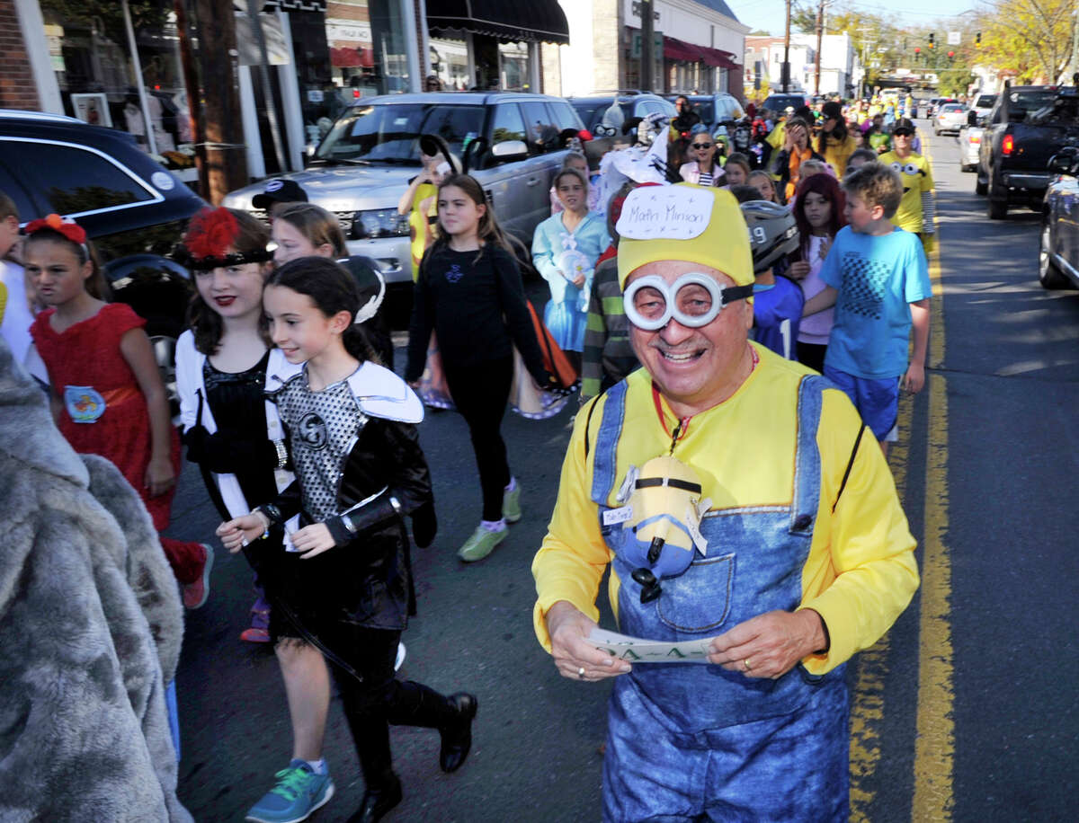 Old Greenwich School substitute teacher Larry Walker was a Minion during the annual Halloween parade at the school and on Sound Beach Avenue in Old Greenwich, Conn., Friday afternoon, Oct. 30, 2015.