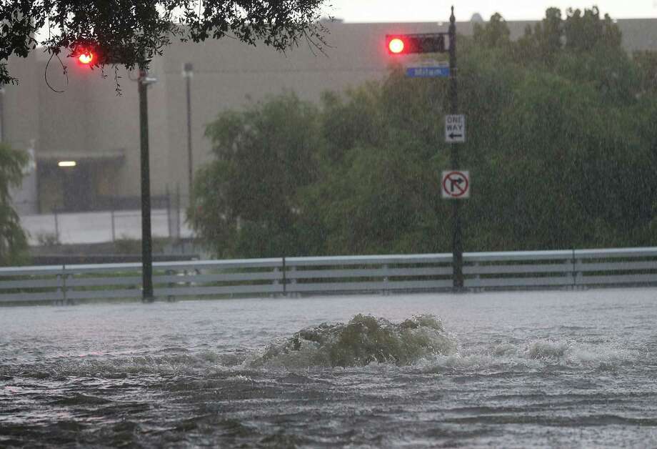 heavy rains flood houston on halloween morning houston chronicle