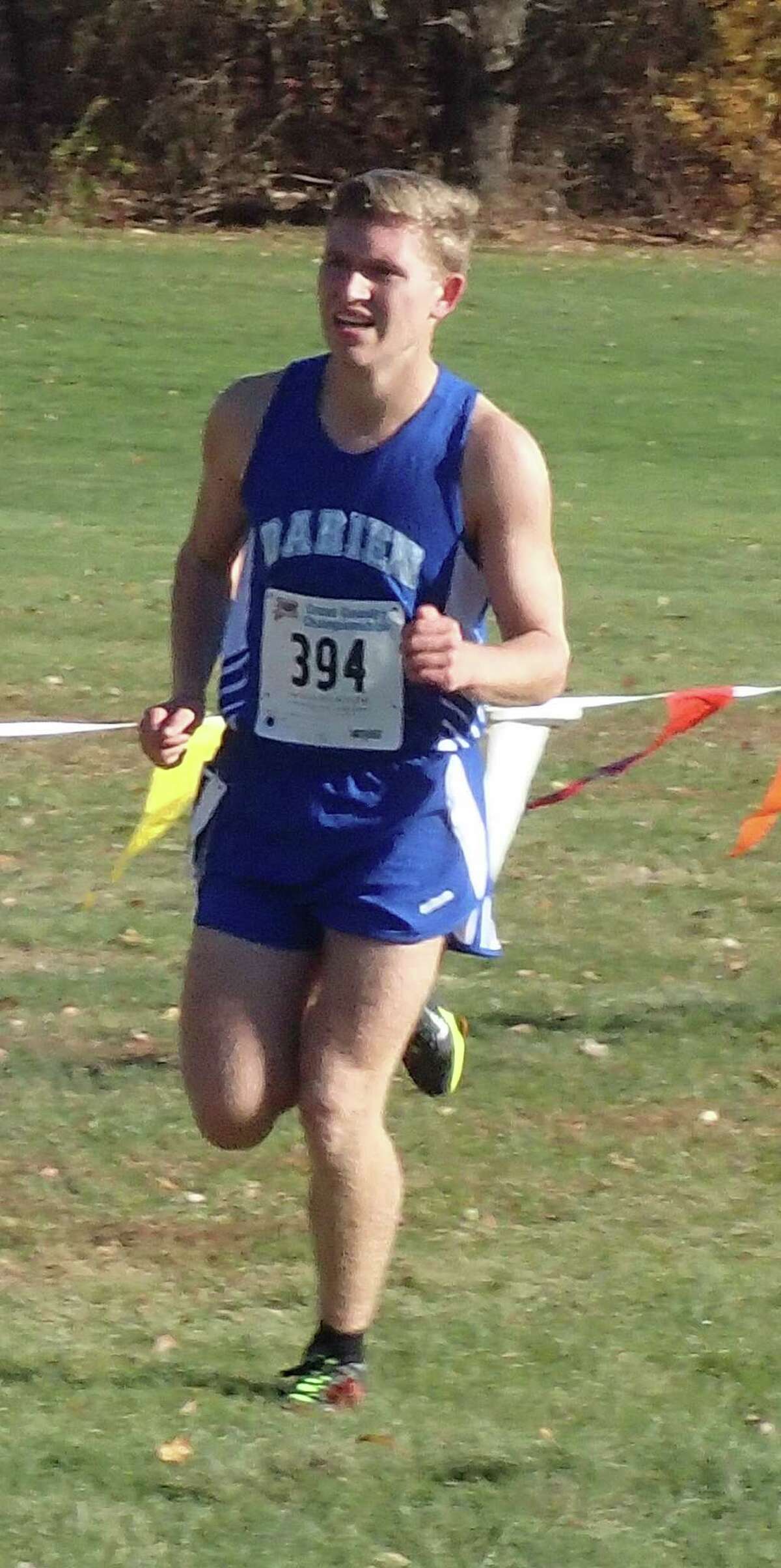 Armstrong Noonan of Darien placed third in the Class L state cross country championship race at Wickham Park on Oct. 31, 2015.