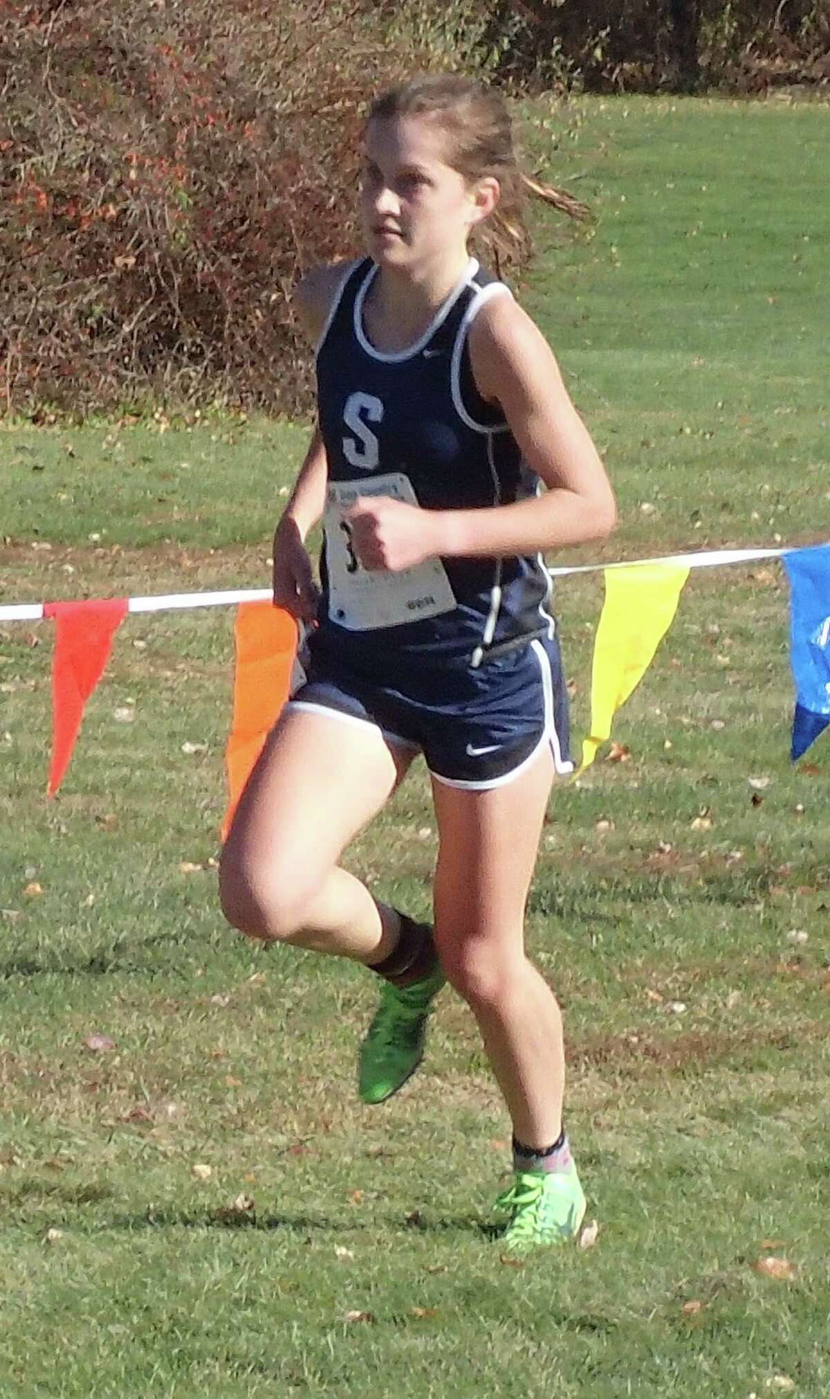 Staples High School senior Hannah DeBalsi won her third straight Class LL state cross country championship with a time of 18:14 at Wickham Park in Manchester on Oct. 31, 2015.
