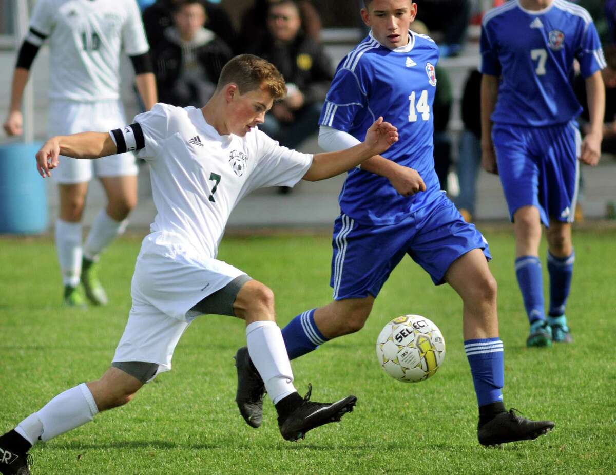 Schalmont's RJ Hayden, left, controls the ball as Broadalbin's Griffin Goodemote defends during their Section II Class B boys' soccer final on Saturday, Oct. 31, 2015, at Colonie High in Colonie, N.Y. (Cindy Schultz / Times Union)