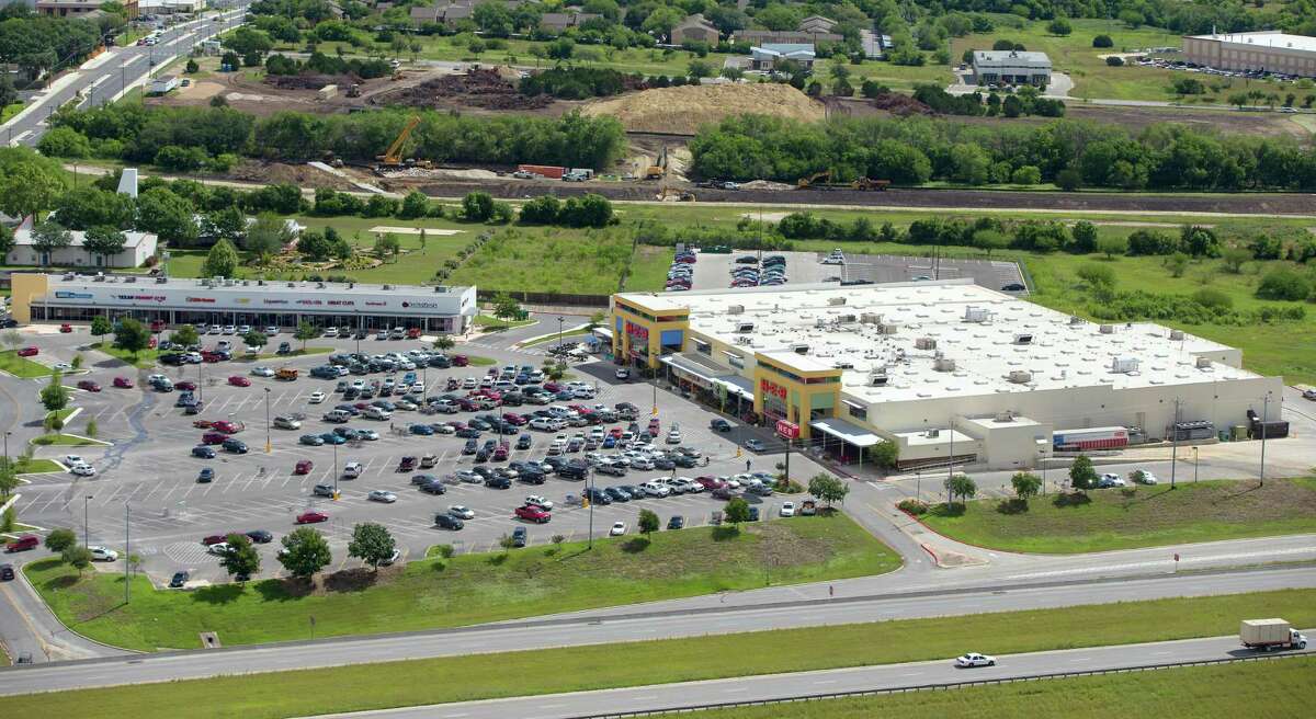 H-E-B is the largest private employer in Texas, with annual revenue of $23 billion. It has 370 stores —318 in Texas and 52 Mexico. An H-E-B is shown in the foreground near the intersection of Loop 1604 and Kitty Hawk Road.