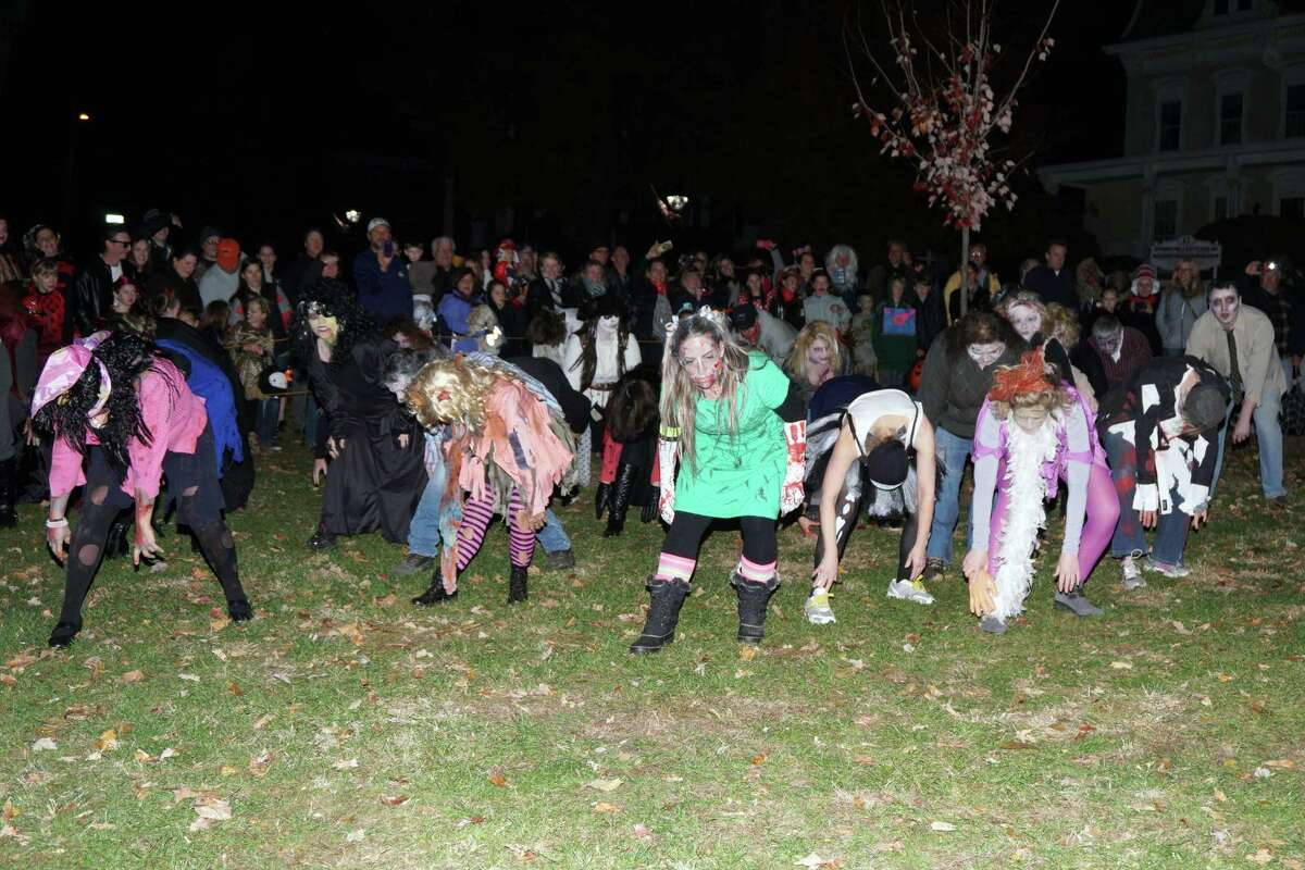 Zombie flash mob spooks New Milford trunkortreat event