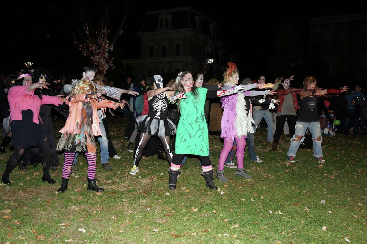 Zombie flash mob spooks New Milford trunkortreat event