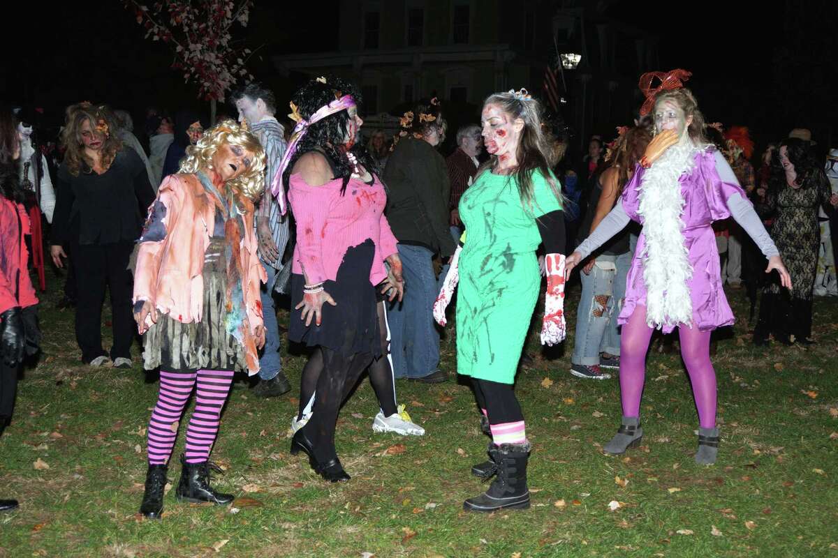 Zombie flash mob spooks New Milford trunkortreat event