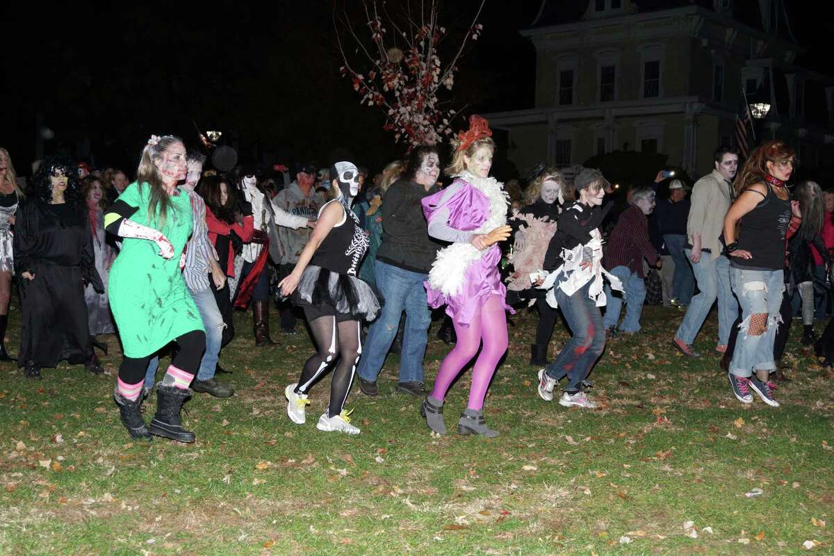 Zombie flash mob spooks New Milford trunkortreat event