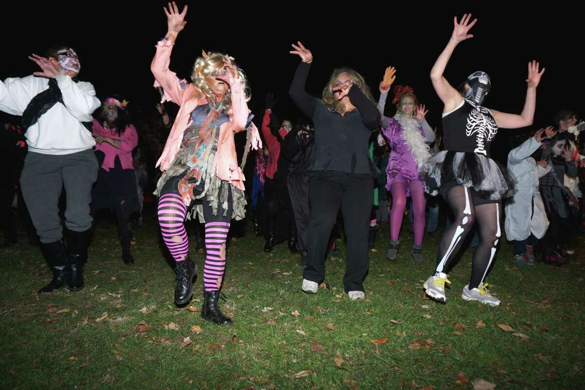 Zombie flash mob spooks New Milford trunkortreat event