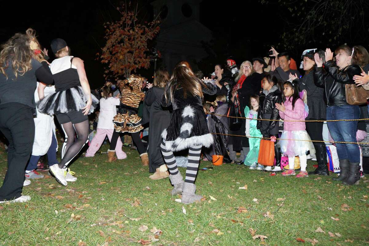 Zombie flash mob spooks New Milford trunkortreat event