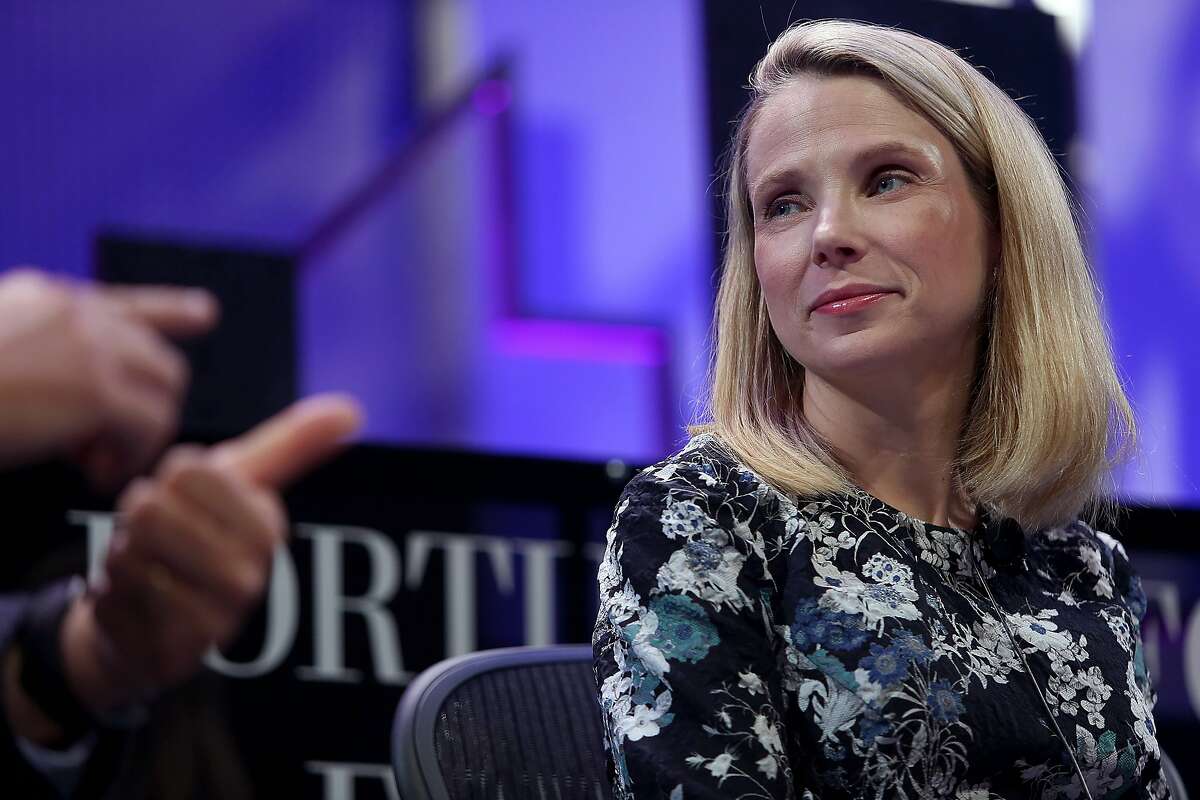 Yahoo CEO Marissa Mayer (right) listens to Salesforce CEO Marc Benioff during the Fortune Global Forum conference in San Francisco, Calif., on Tuesday, November 3, 2015.