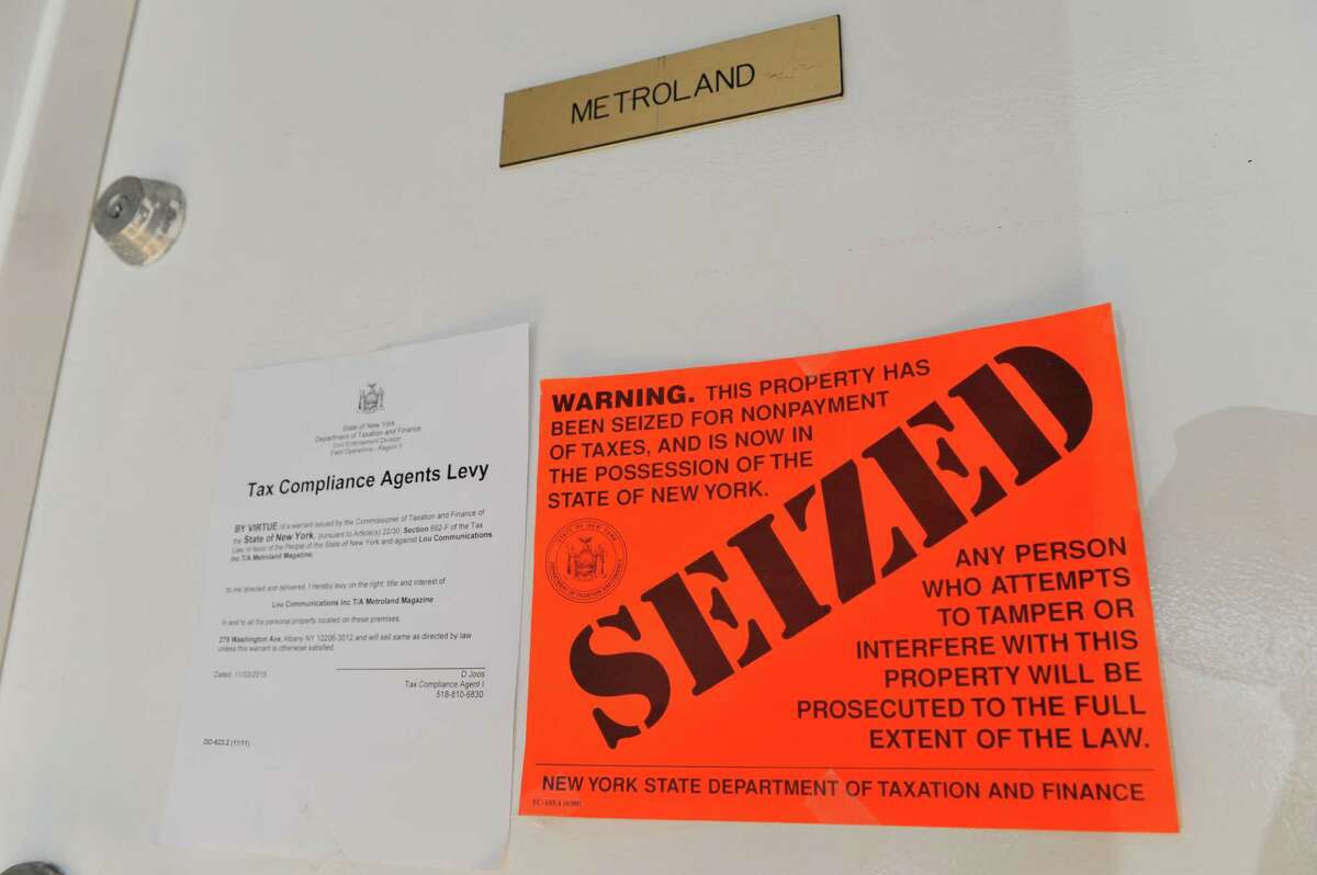 A view of the front door to the office of MetroLand, seen here on Tuesday, Nov. 3, 2015, in Albany, N.Y. New York State Department of Taxation & Finance has seized the offices and property of the Capital Region alternative weekly for non-payment of taxes. (Paul Buckowski / Times Union)