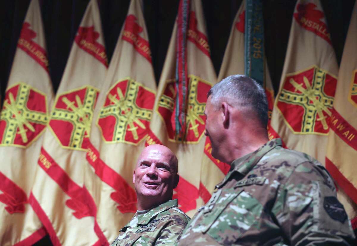 Newly appointed commander of the Installation Management Command Lt. Gen.Kenneth Dahl, left, smiles Tuesday afternoon Nov. 3, 2015 at Joint Base San Antonio-Ft. Sam Houston with out-going commander Lt. Gen. David Halverson moments after Dahl received command of IMCOM.