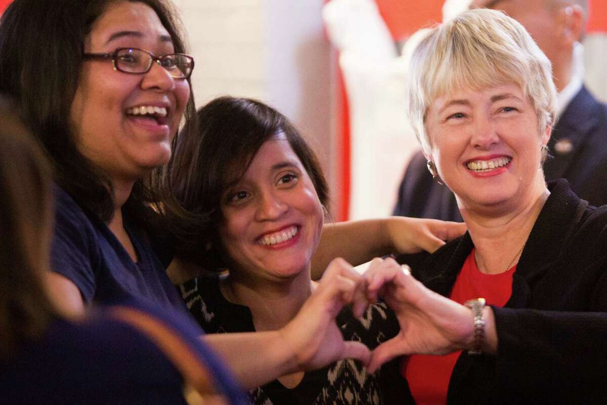 Mayor Annise Parker with HERO supporters Griselda Velazquez, left, and Michelle Garcia in November of 2015 during the election night watch party for the Houston Equal Rights Ordinance.