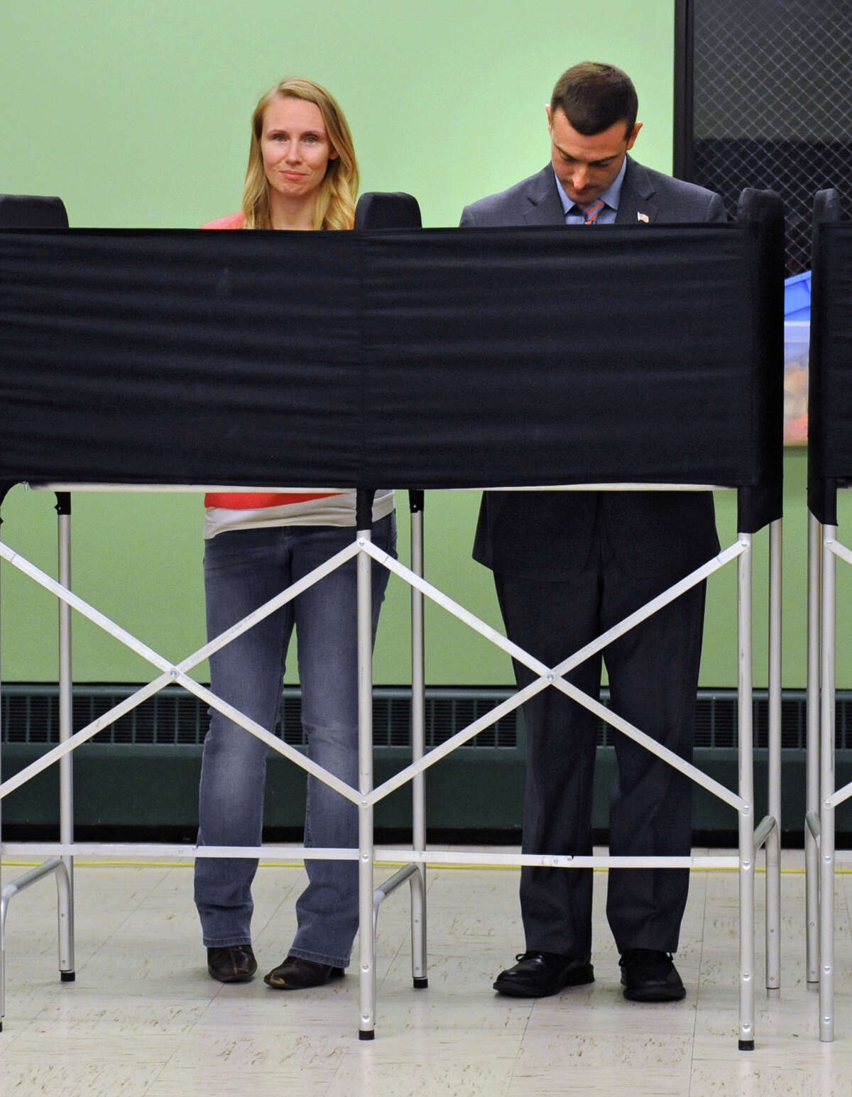 Jim Gordon and his wife Melissa vote at the Lansingburgh Boys and Girls Club on Tuesday, Nov. 3, 2015 in Troy, N.Y. Jim, a Republican on the City Council, was running for Troy mayor. In November, he won a seat on the North Greenbush Town Board. (Lori Van Buren / Times Union)