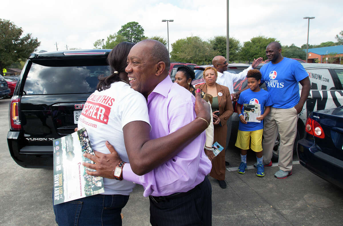 Mayoral candidate Sylvester Turner, right, hugs Brenda Wortham, left, after he arrived at Shadydale Elementary, Tuesday, Nov. 3, 2015, in Houston. (Cody Duty / Houston Chronicle)