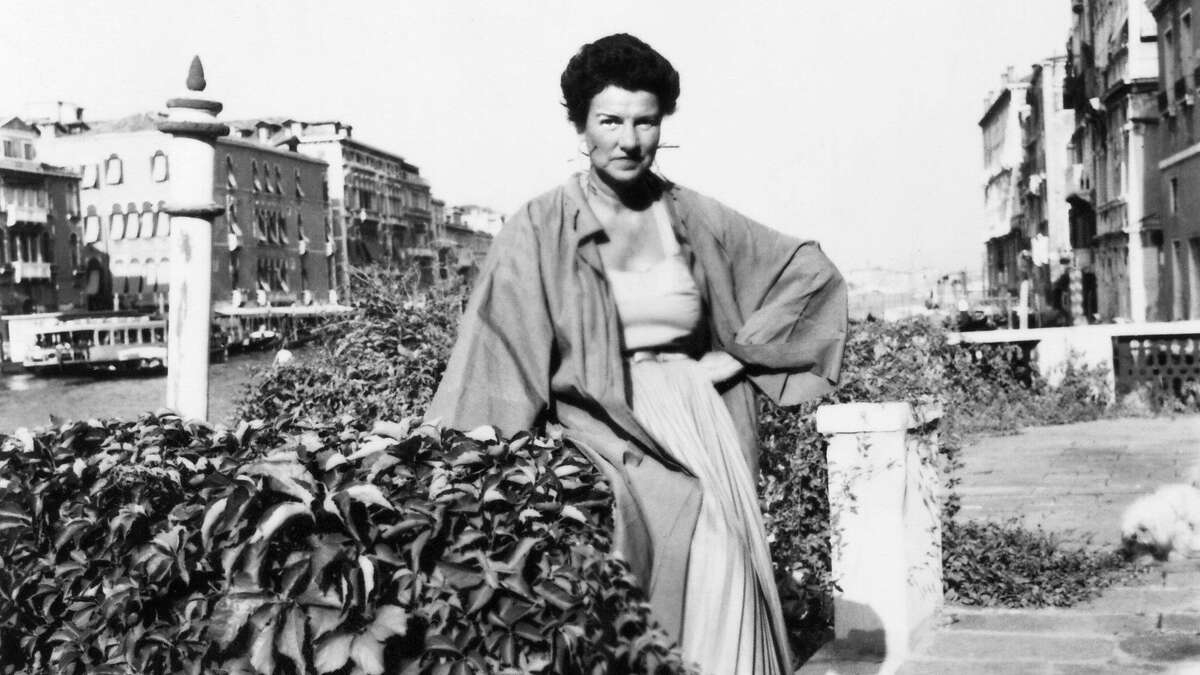 Peggy Guggenheim on the banks of the Grand Canal in Venice. Guggenheim is the subject of the new documentary "Peggy Guggenheim: Art Addict," directed by Lisa Immordino Vreeland. Credit: Courtesy of the Peggy Guggenheim Collection Archives, Venice